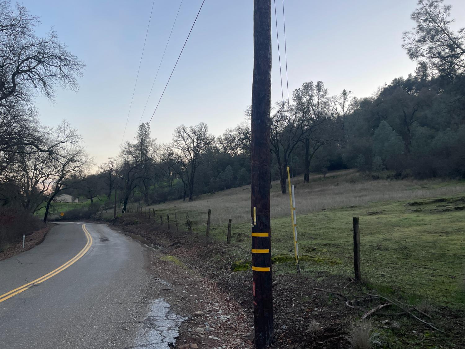 0 Rossler Road Placerville, CA 95667 - Photo 10 of 11 a view of a road with a tree in the background