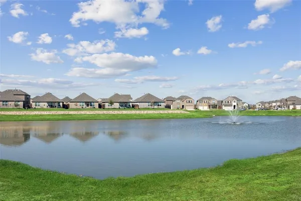 a view of a lake with houses