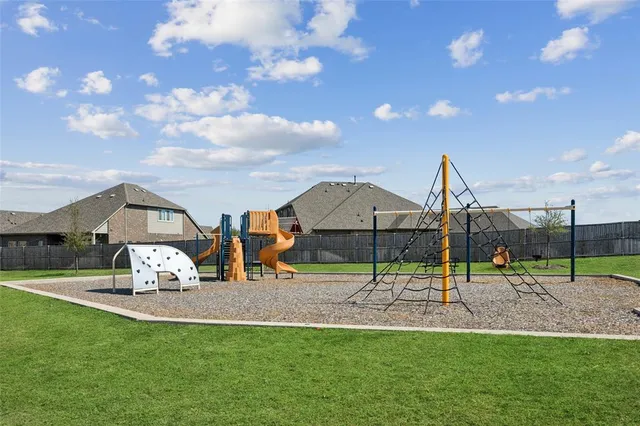 a view of a garden with a slide