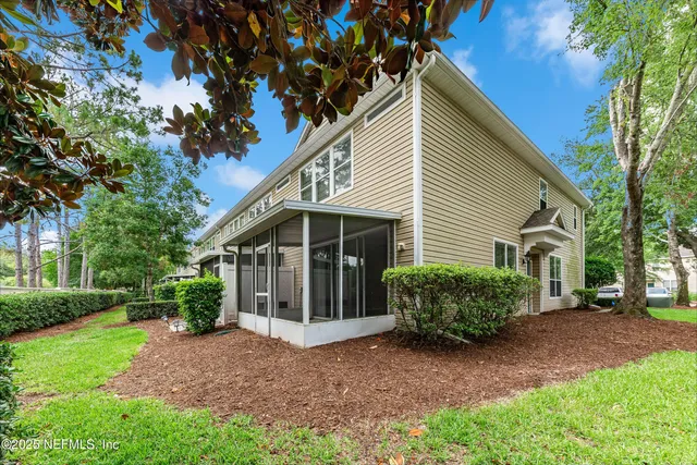 a view of a house with a garden