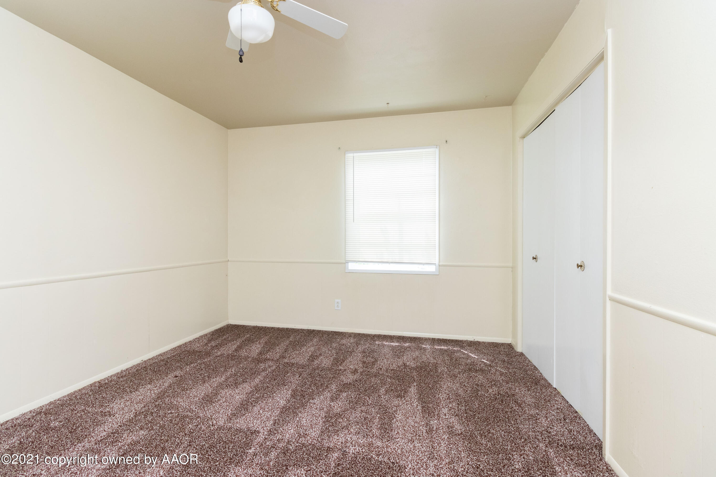 4629 South Lipscomb Street Amarillo, TX 79110 - Photo 7 of 12 an empty room with a window
