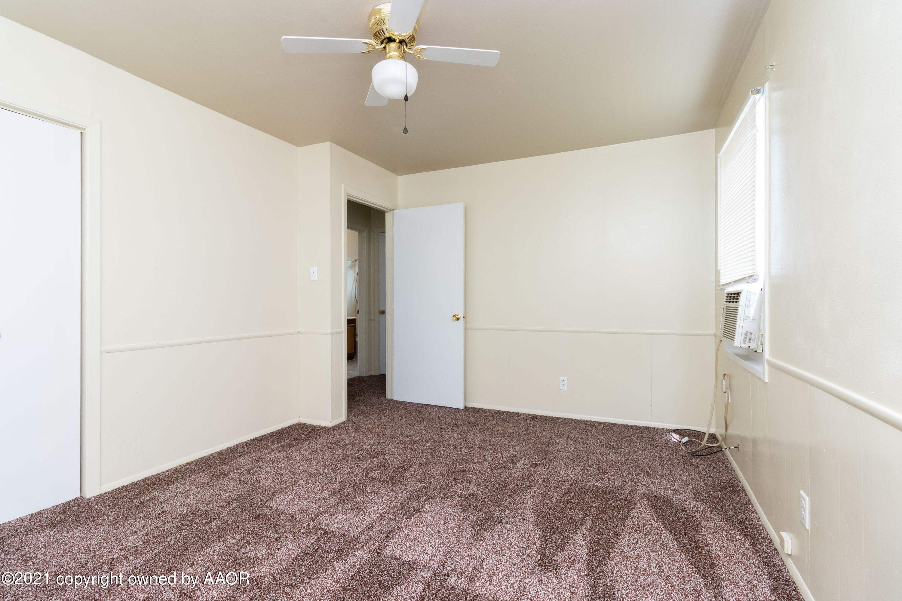 4629 South Lipscomb Street Amarillo, TX 79110 - Photo 8 of 12 wooden floor in an empty room