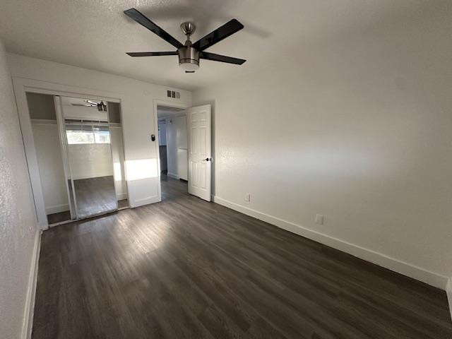 18202 North Cave Creek Road, Unit 209 Phoenix, AZ 85032 - Photo 4 of 12 a view of empty room with wooden floor and window