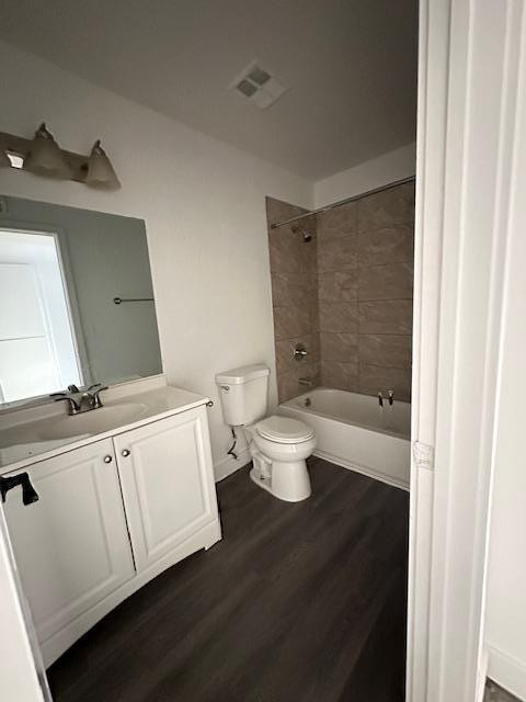 18202 North Cave Creek Road, Unit 209 Phoenix, AZ 85032 - Photo 7 of 12 a bathroom with a toilet a sink and bathtub