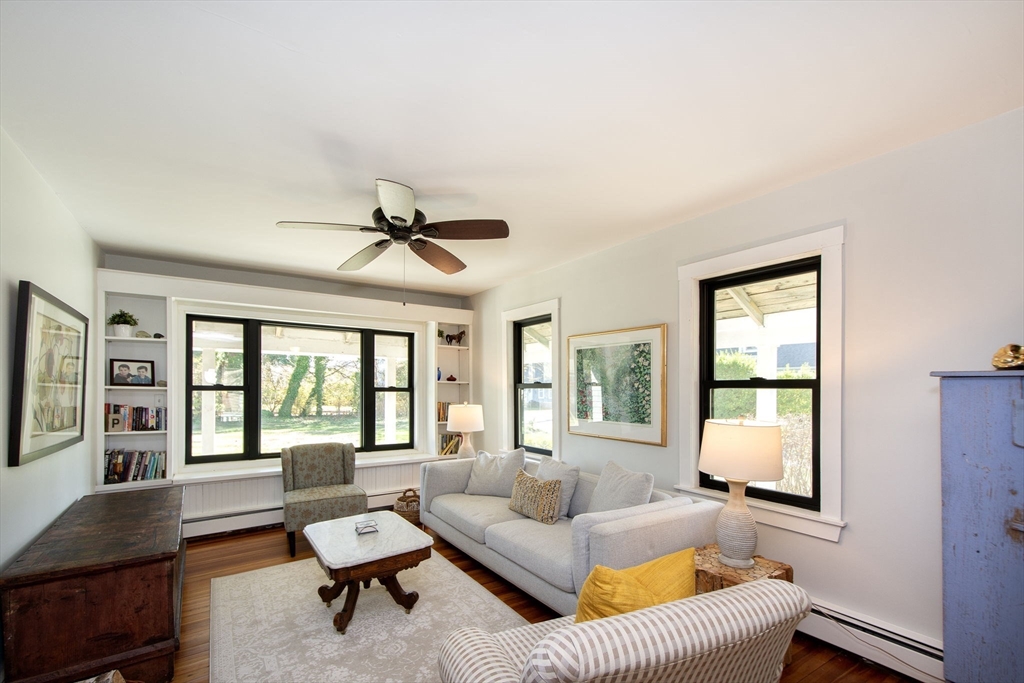 20 Driftway Scituate, MA 02066 - Photo 15 of 42 a living room with furniture and a large window