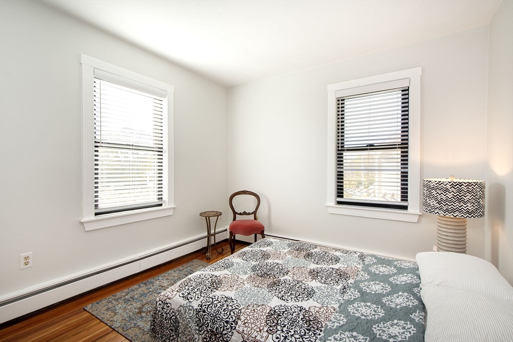 20 Driftway Scituate, MA 02066 - Photo 22 of 42 a bedroom with a bed and a window