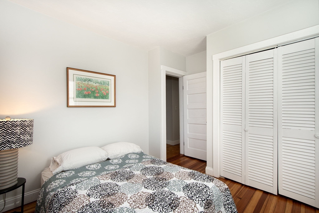 20 Driftway Scituate, MA 02066 - Photo 23 of 42 a bedroom with a bed and a window