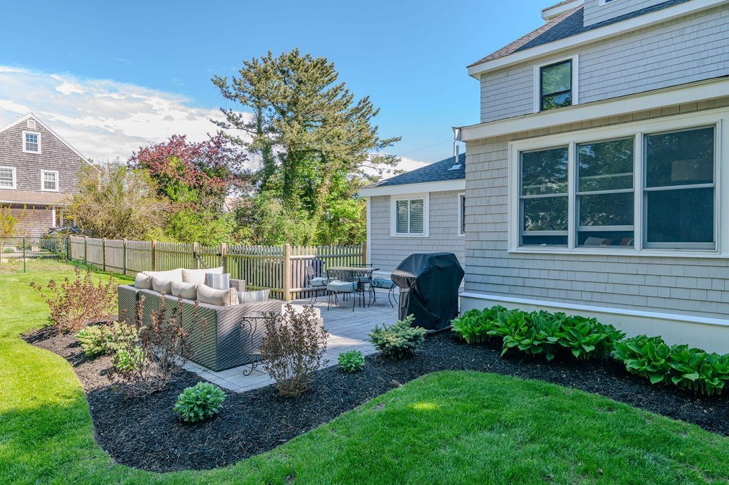 20 Driftway Scituate, MA 02066 - Photo 30 of 42 a view of a house with backyard and sitting area