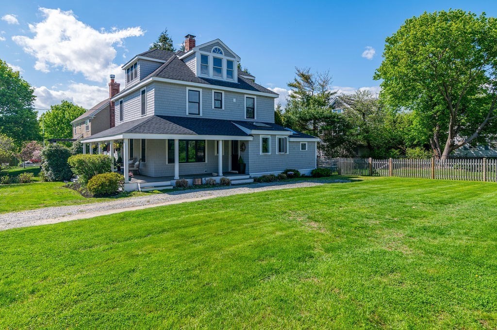 20 Driftway Scituate, MA 02066 - Photo 3 of 42 a front view of a house with garden