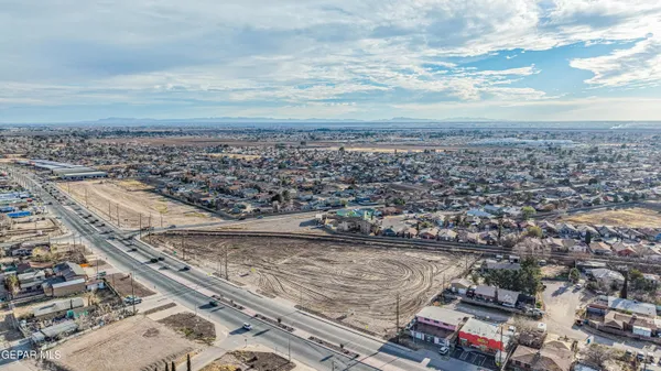 an aerial view of beach and city