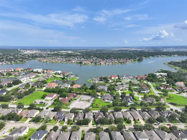 an aerial view of a city with lots of residential buildings