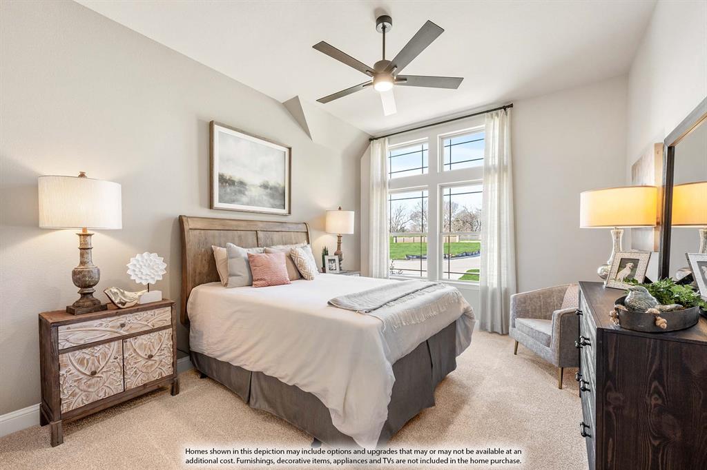 2206 Redding Drive Venus, TX 76084 - Photo 7 of 31 a bedroom with a large bed and a window