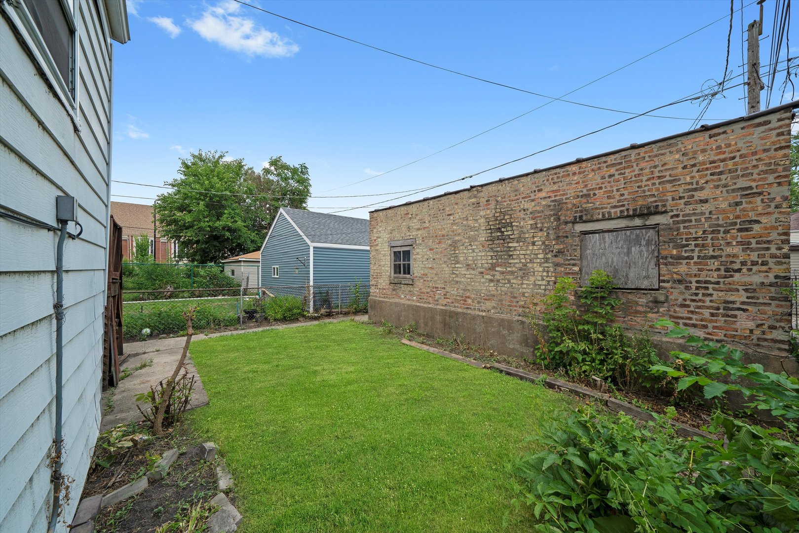 7611 South Aberdeen Street Chicago, IL 60620 - Photo 38 of 45 a view of back yard of the house