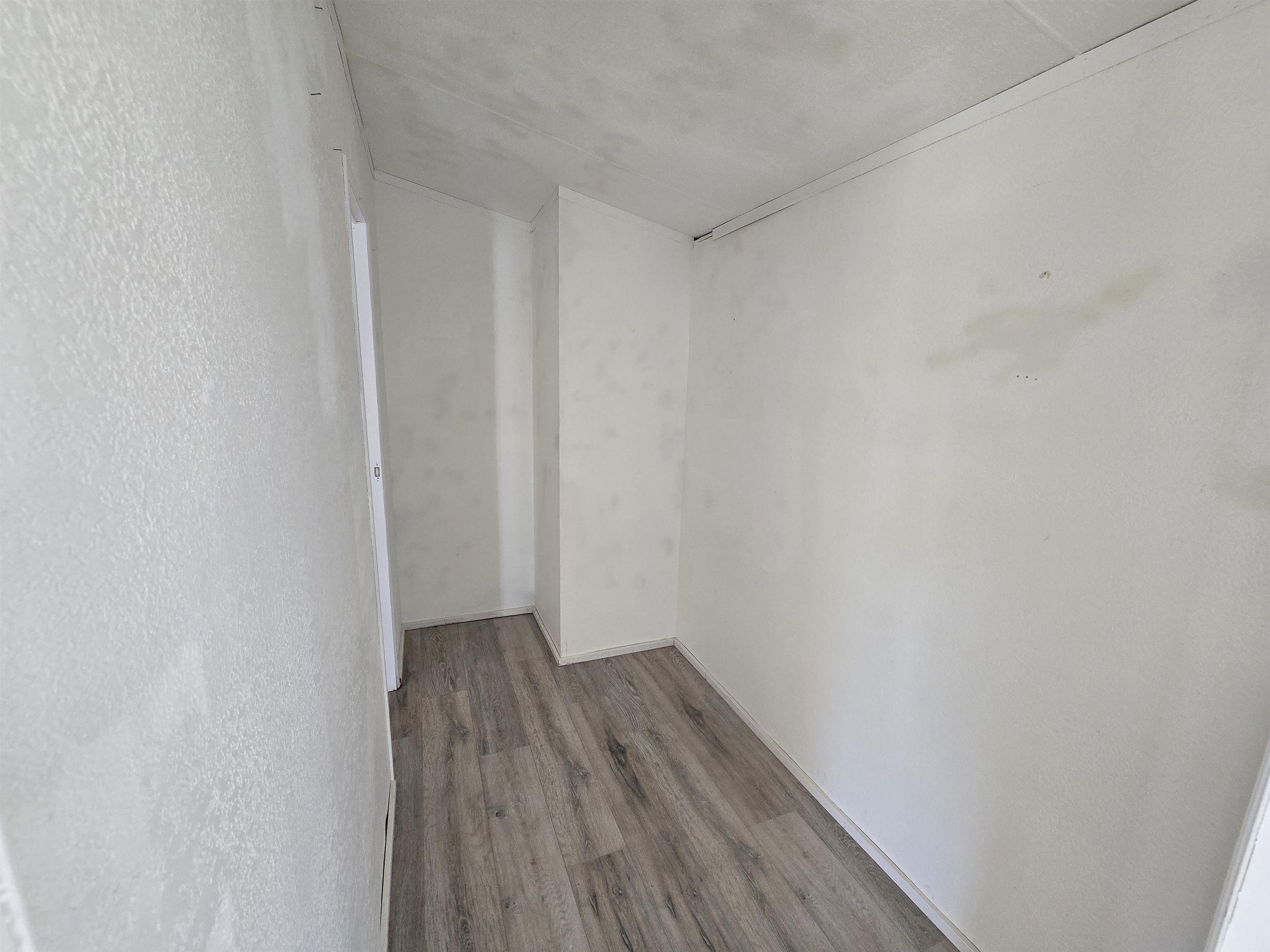 675 1/2 24 1/2 Road Grand Junction, CO 81505 - Photo 13 of 25 a view of a small space with wooden floor