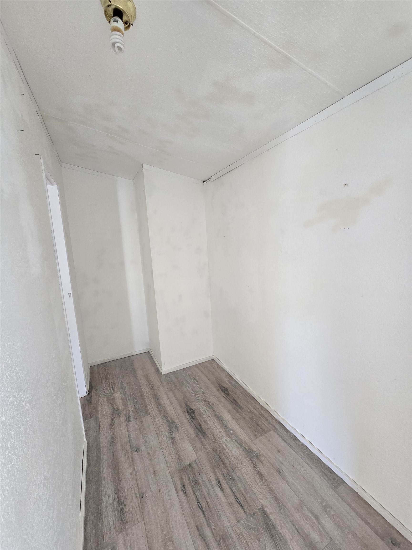 675 1/2 24 1/2 Road Grand Junction, CO 81505 - Photo 14 of 25 an empty room with wooden floor