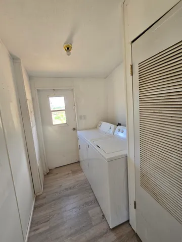 a view of utility room with washer and dryer