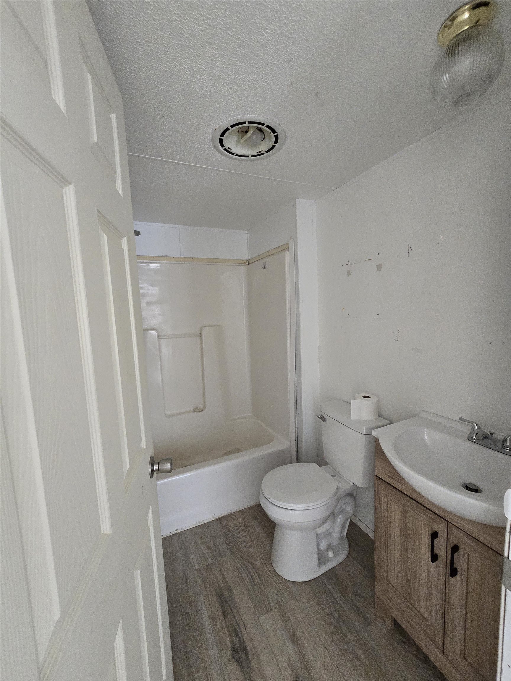 675 1/2 24 1/2 Road Grand Junction, CO 81505 - Photo 21 of 25 a bathroom with a sink a toilet a shower and a window