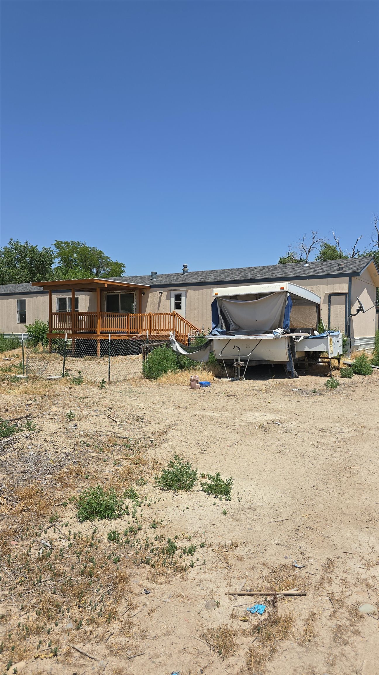 675 1/2 24 1/2 Road Grand Junction, CO 81505 - Photo 24 of 25 a view of houses with outdoor space