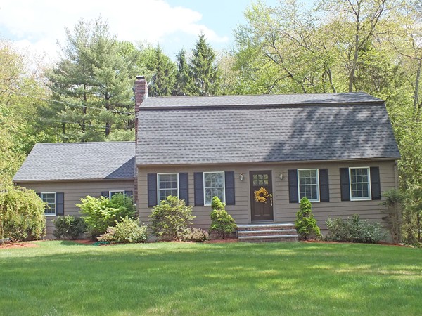 7 Conestoga Road Chelmsford, MA 01824 - Photo 1 of 29 a front view of a house with a garden
