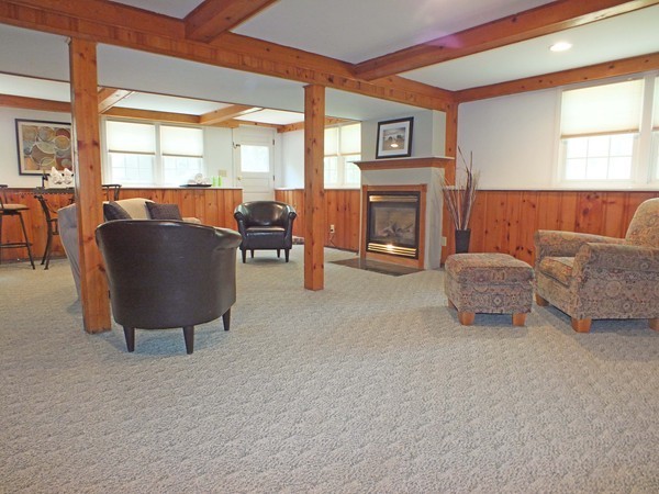 7 Conestoga Road Chelmsford, MA 01824 - Photo 23 of 29 a living room with furniture and a fireplace