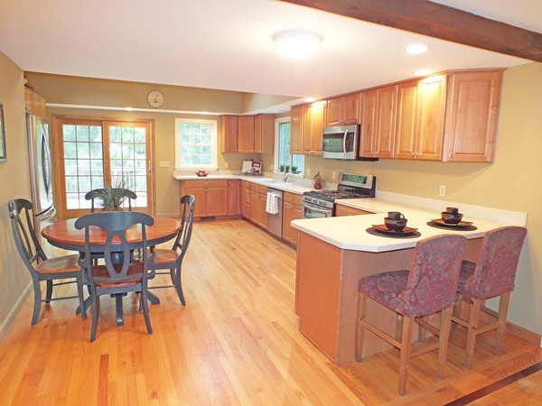 7 Conestoga Road Chelmsford, MA 01824 - Photo 5 of 29 a view of a dining room with furniture and wooden floor