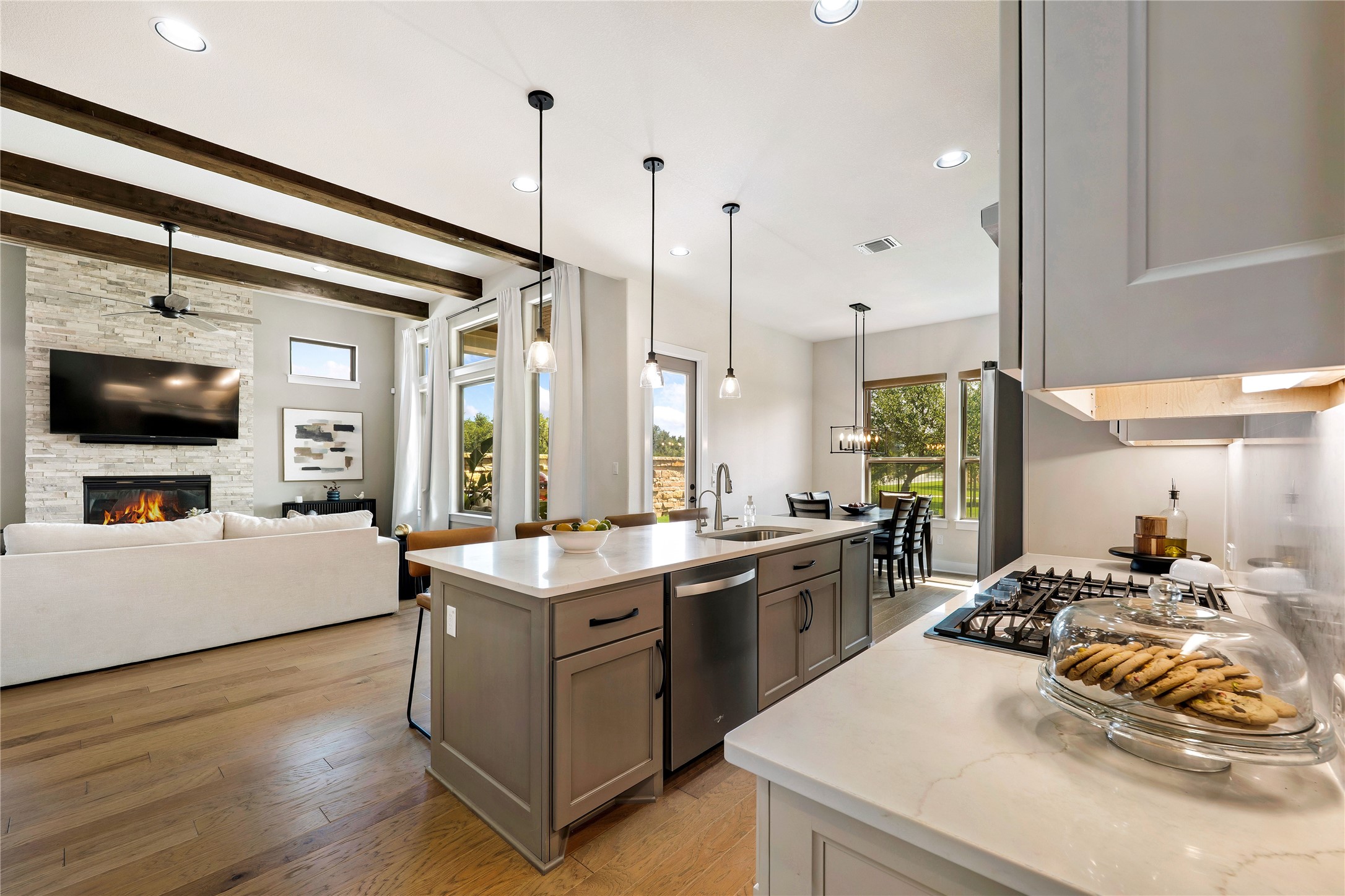 2408 Nate's Place Georgetown, TX 78633 - Photo 12 of 40 Culinary creations come alive in this meticulously appointed kitchen featuring an expansive central island and premium appliances.