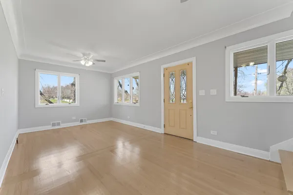a view of empty room with windows