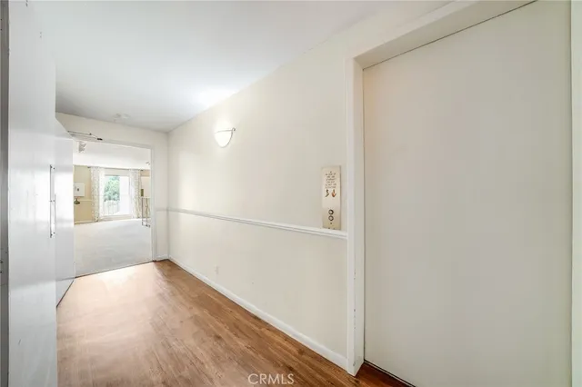 a street sign on a wall with a street sign