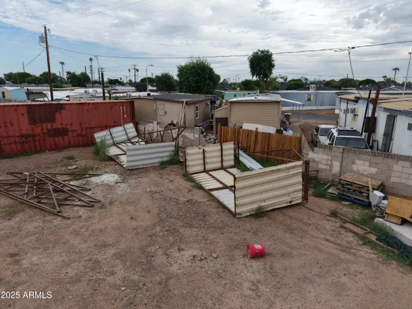 a view of a lake with a car parked on the road