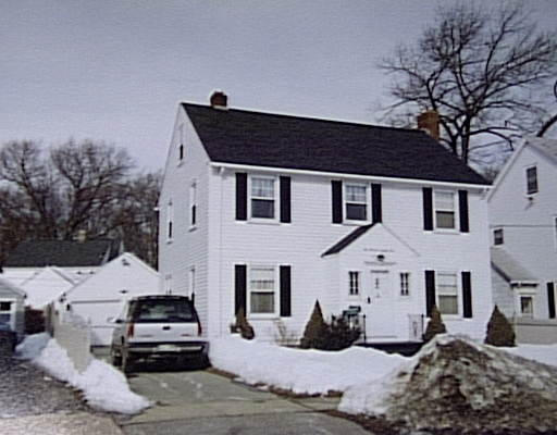284 Chapin Terrace Springfield, MA 01104 - Photo 1 of 1 a view of a white house with a yard