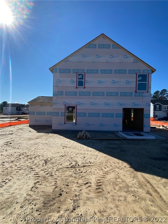 1721 Ennismore Road Hope Mills, NC 28348 - Photo 8 of 9 a front view of a house with a yard