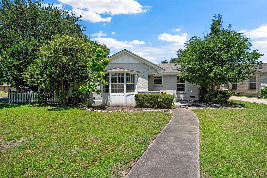 3225 Windsor Avenue Waco, TX 76708 - Photo 1 of 25 Exterior featuring a prominent bay window, stucco siding, and a shingle roof