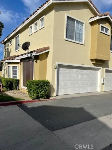 a front view of a house with a outdoor space
