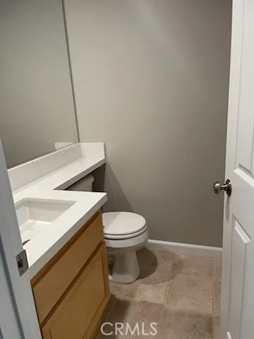 a bathroom with a sink and toilet