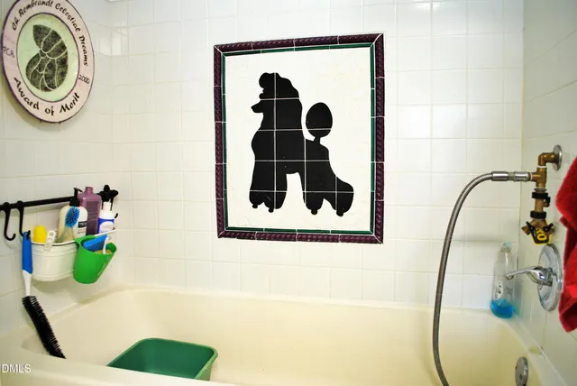 a room with painting and a table