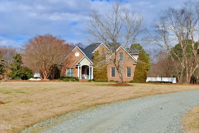 a backyard of a house with seating space