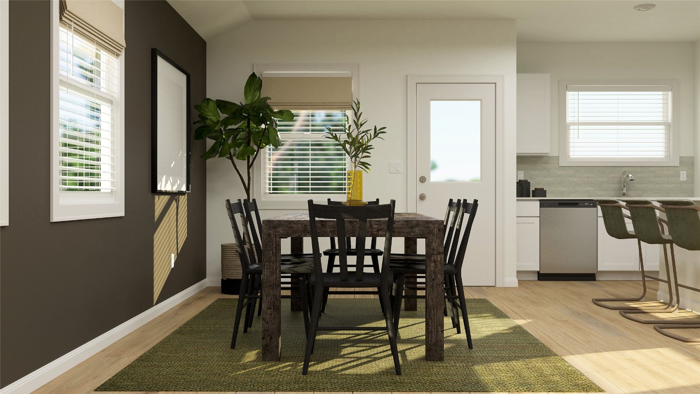 18024 Prairie Falcon Way Pflugerville, TX 78660 - Photo 13 of 23 a view of a dining room with furniture and window