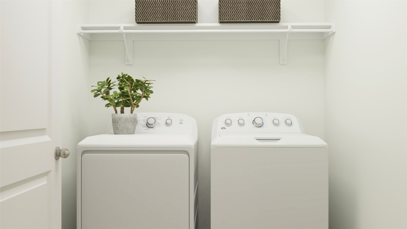 18024 Prairie Falcon Way Pflugerville, TX 78660 - Photo 22 of 23 a utility room with dryer and washer