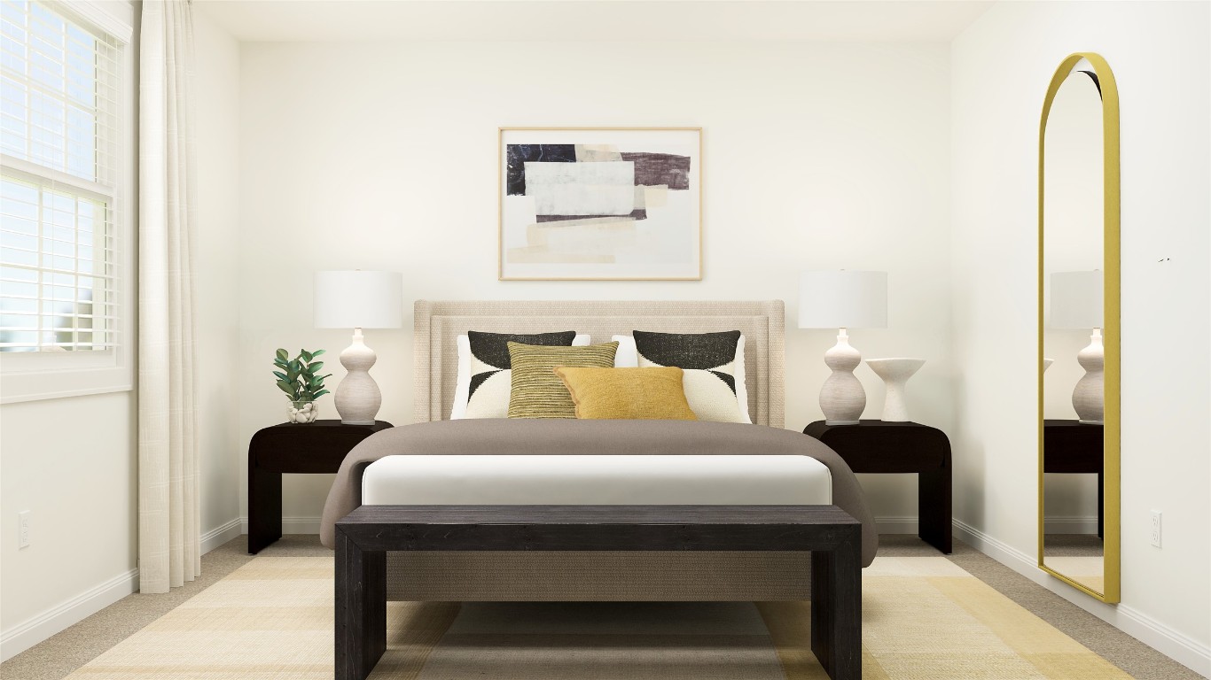 18024 Prairie Falcon Way Pflugerville, TX 78660 - Photo 5 of 23 a bedroom with a bed lamp and a potted plant