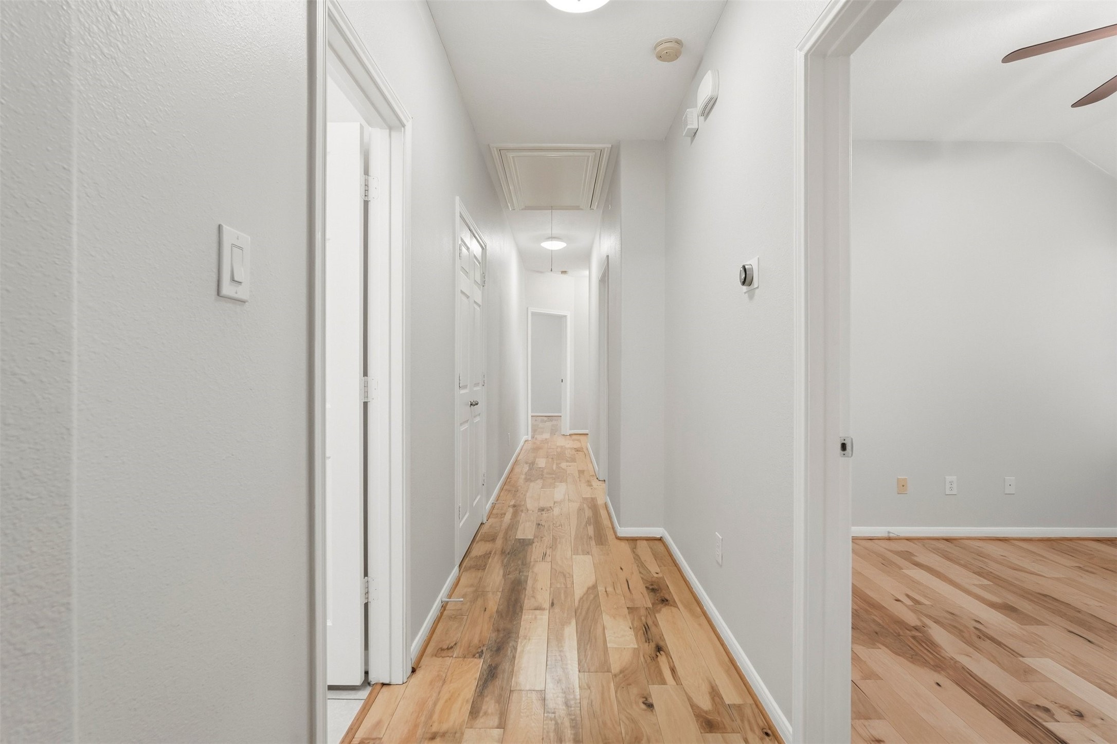 13218 South Point Lane Houston, TX 77034 - Photo 13 of 25 a view of a hallway with wooden floor and closet