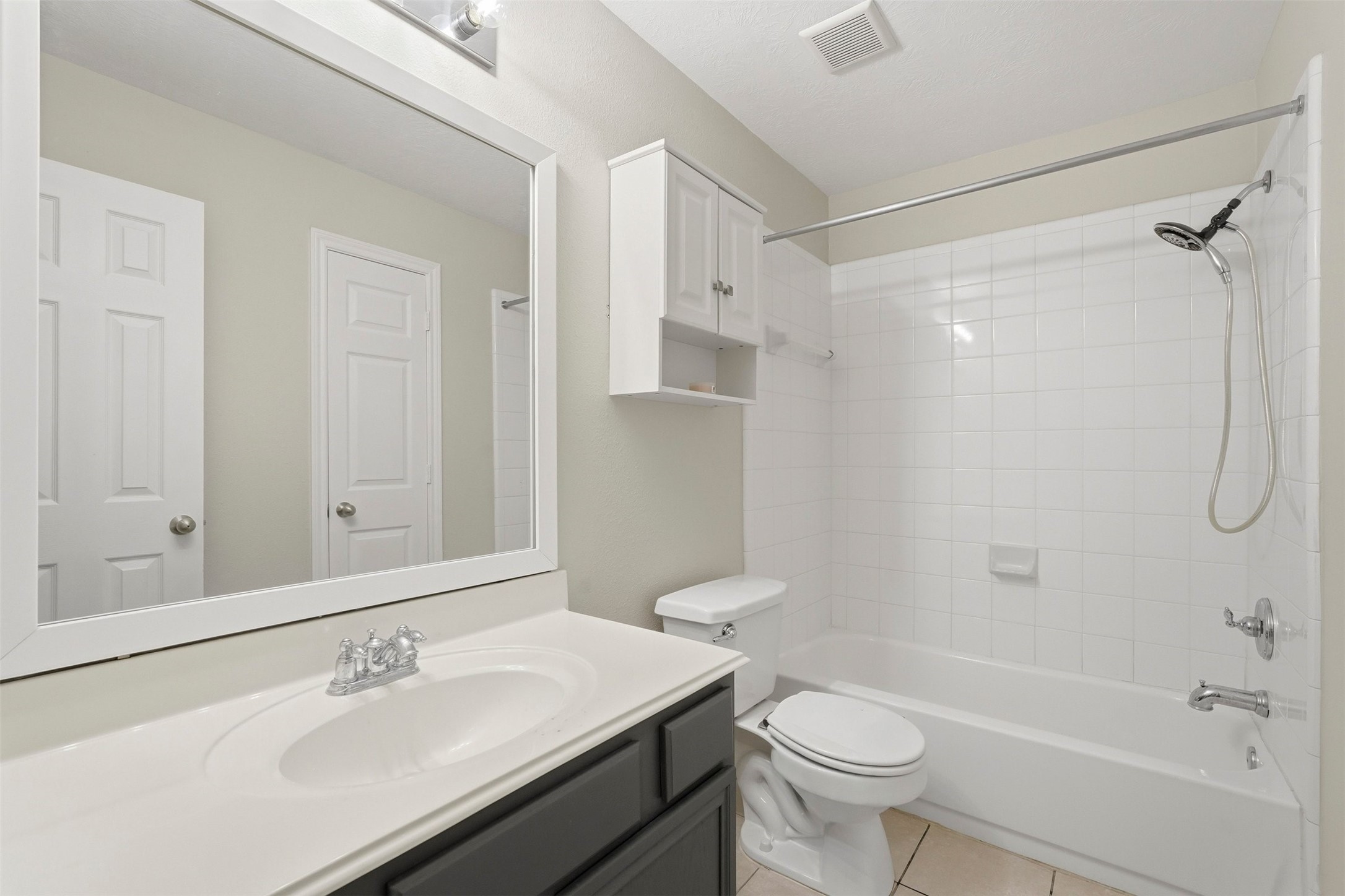 13218 South Point Lane Houston, TX 77034 - Photo 17 of 25 a bathroom with a sink a toilet and shower