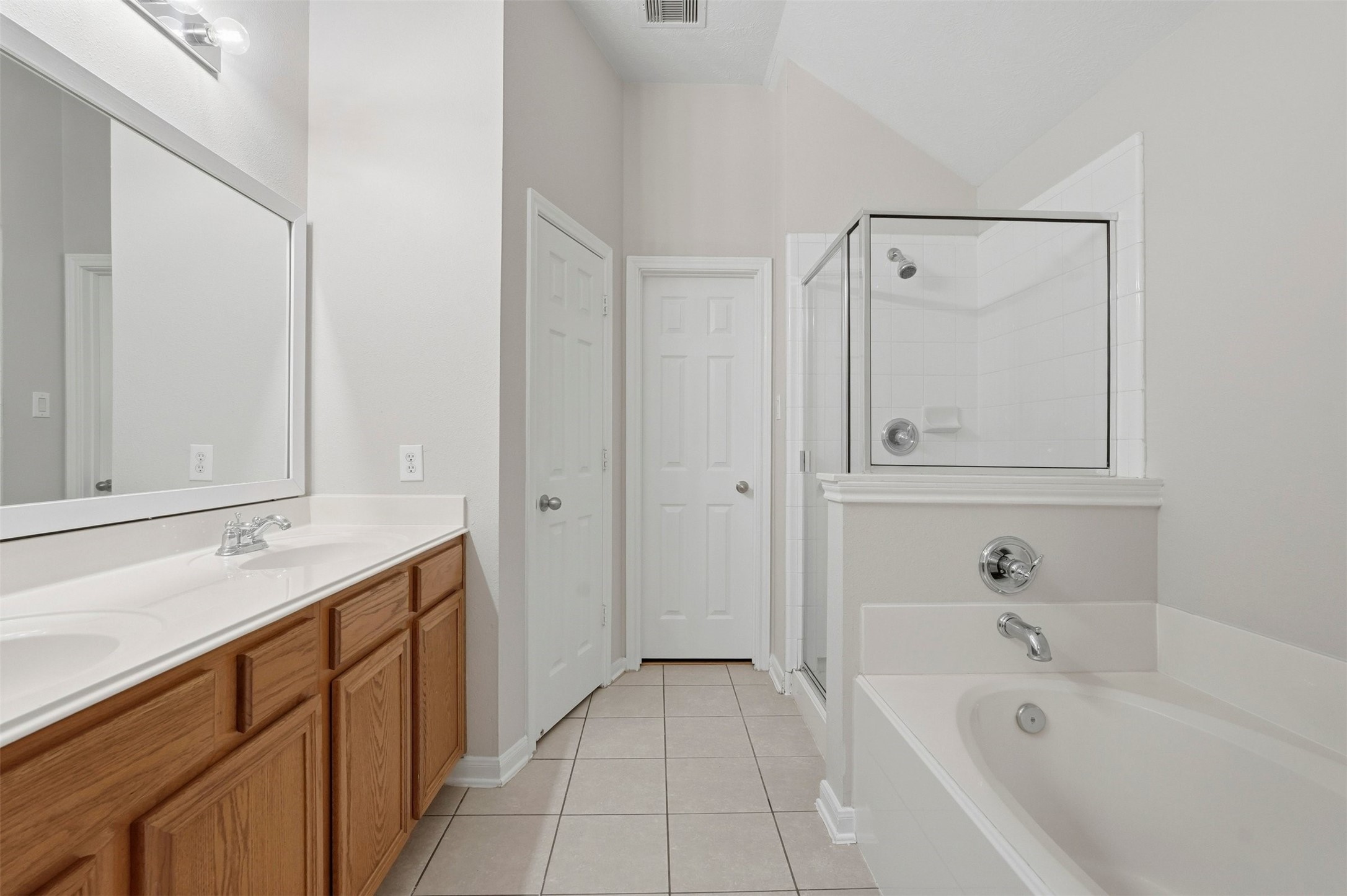 13218 South Point Lane Houston, TX 77034 - Photo 21 of 25 a spacious bathroom with a tub shower and sink