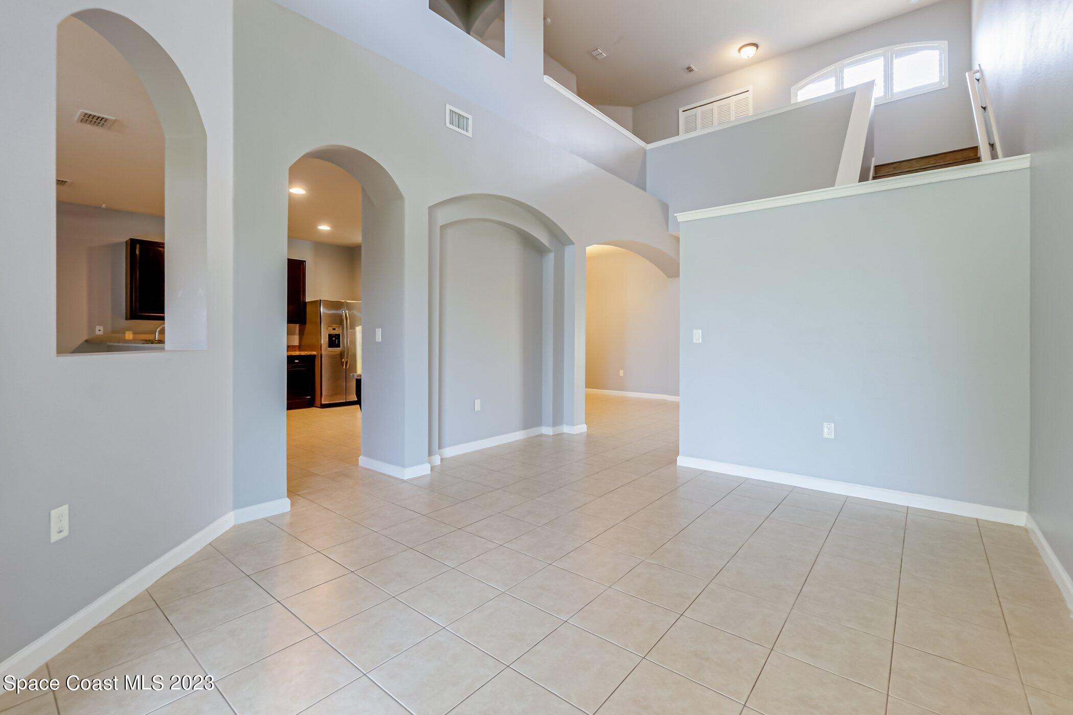 3194 Arden Circle Melbourne, FL 32934 - Photo 13 of 40 a view of a hallway with entryway