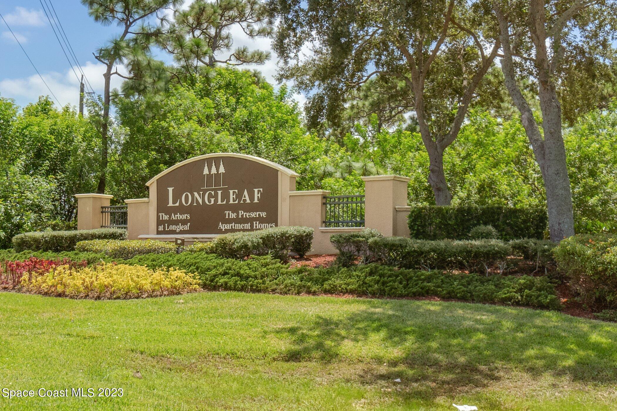 3194 Arden Circle Melbourne, FL 32934 - Photo 3 of 40 a sign of golf club on a wall under a tree