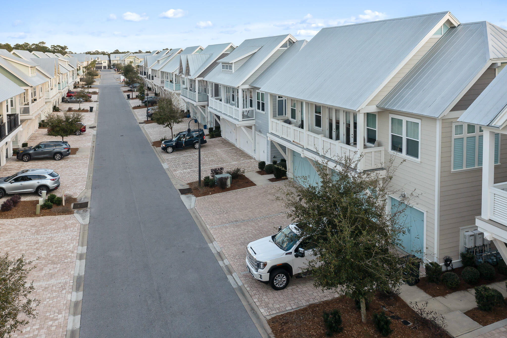 85 York Ln Inlet Beach, Unit A Inlet Beach, FL 32461 - Photo 11 of 40 an aerial view of multiple houses with yard