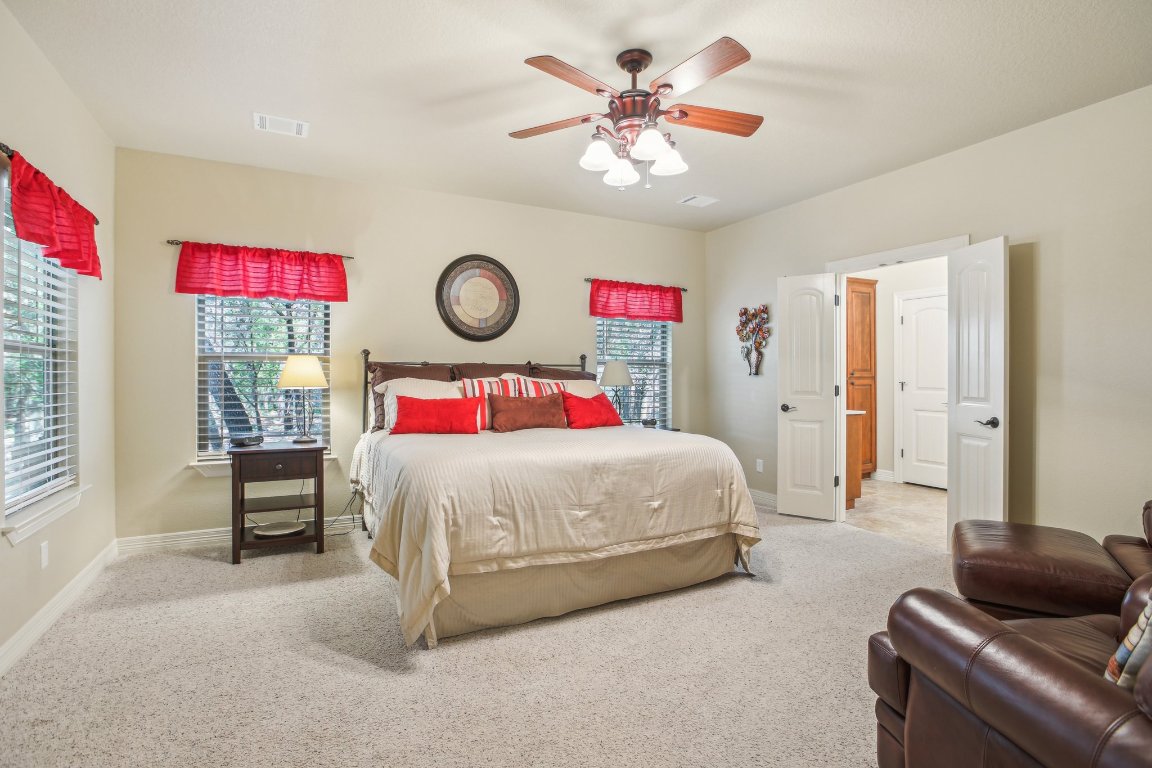 600 Augusta Circle Point Venture, TX 78645 - Photo 14 of 38 The primary bedroom easily holds a king bed