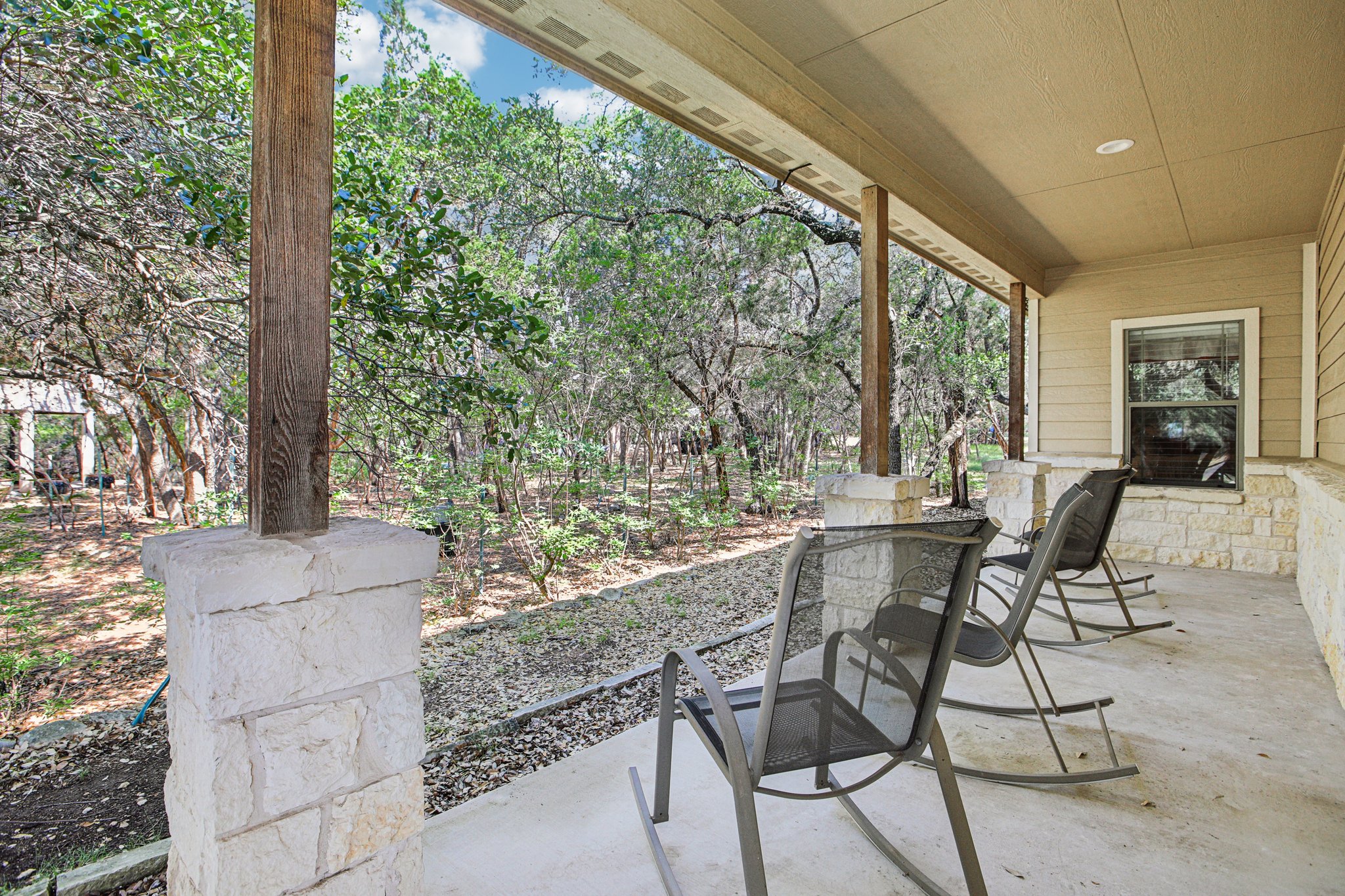 600 Augusta Circle Point Venture, TX 78645 - Photo 30 of 38 a view of a patio with furniture and a yard