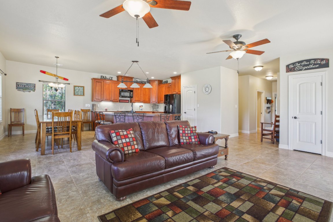 600 Augusta Circle Point Venture, TX 78645 - Photo 7 of 38 Another view of the living area, open to the kitchen and dining areas