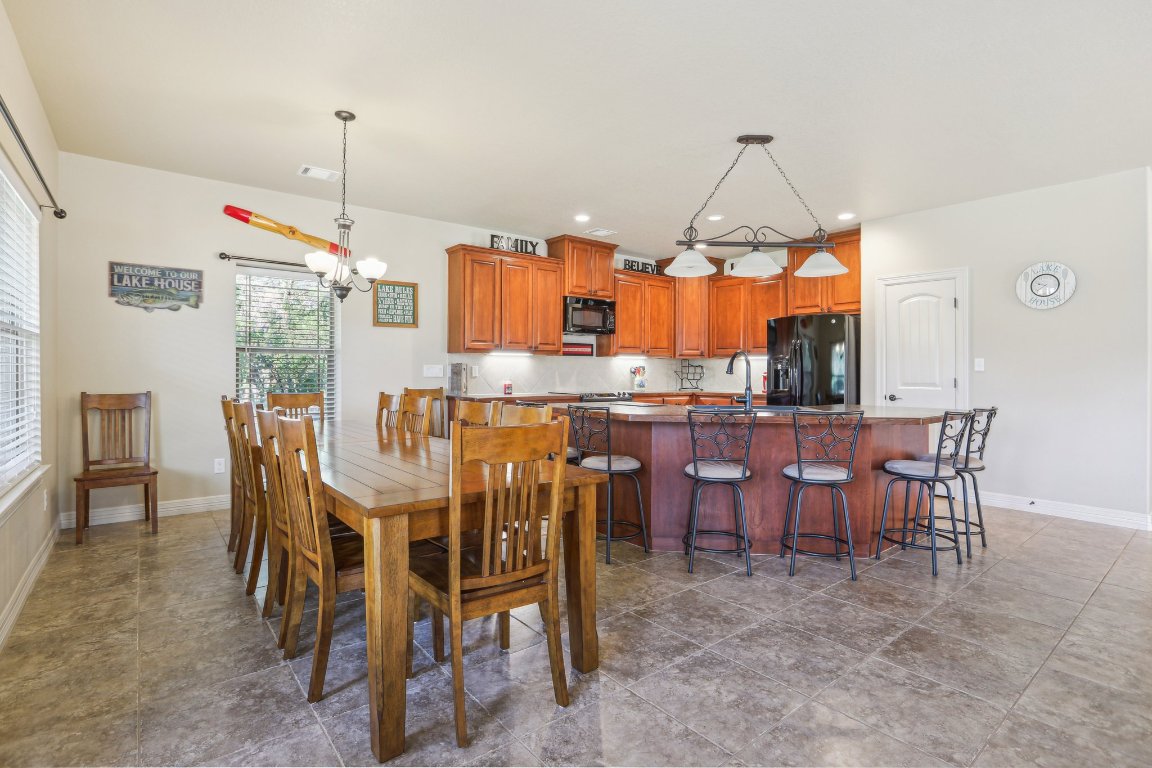 600 Augusta Circle Point Venture, TX 78645 - Photo 10 of 38 This dining area is huge!