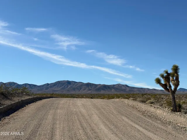 a view of mountains and valleys